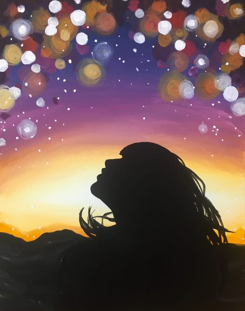 Silhouette of a girl gazing at the stars. A fun galaxy painting!